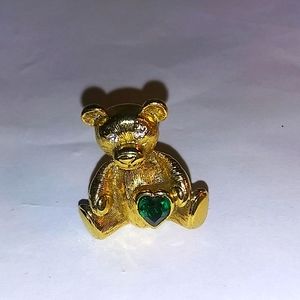 Signed 1928 gold tone bear green birth stone and clear rhinestone eyes